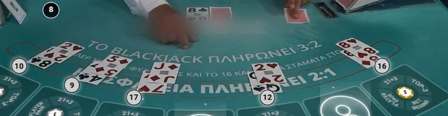 A live dealer blackjack table. The dealer shows an 8 and your seat has 8 and 8.